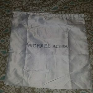 Michael Kors draw string duster bag